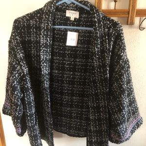 Tweed like swing jacket.